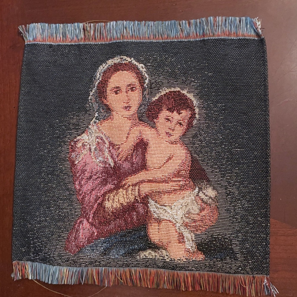 Tapestry Art with Madonna and baby Jesus.